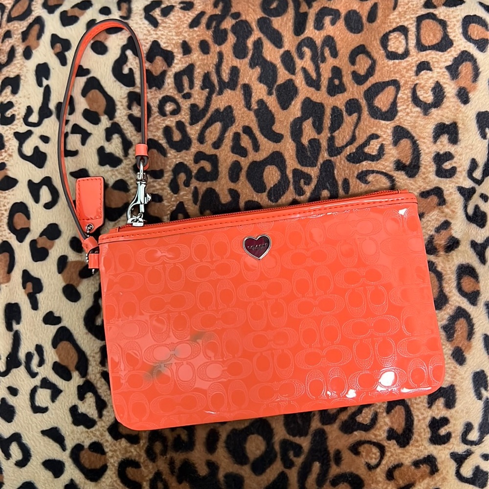 Orange Coach Wristlet